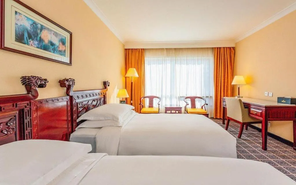 Bed in Grand Skylight Hotel Royal, Beijing