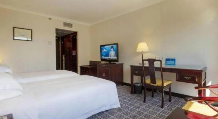 Bed in Grand Skylight Hotel Royal, Beijing