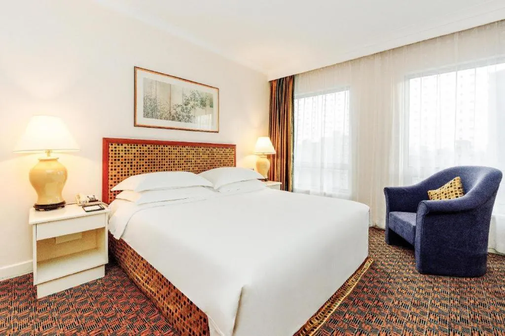 Bed in Grand Skylight Hotel Royal, Beijing