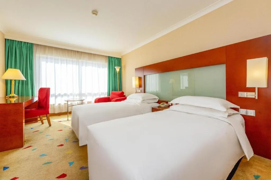 Bed in Grand Skylight Hotel Royal, Beijing