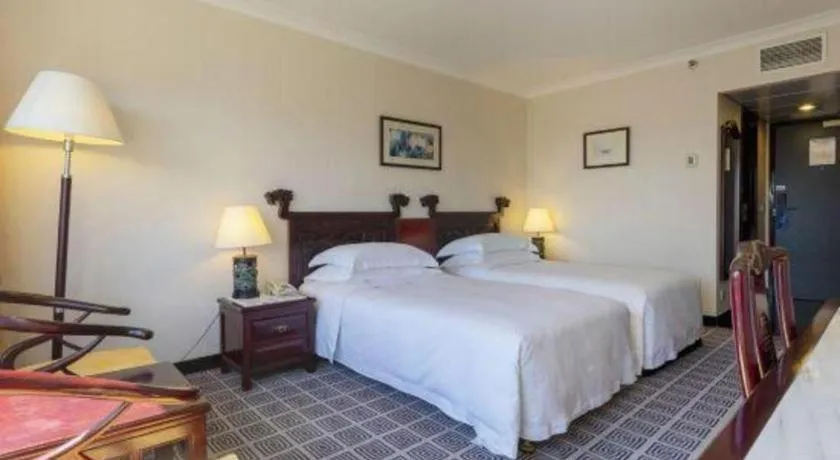 Bed in Grand Skylight Hotel Royal, Beijing