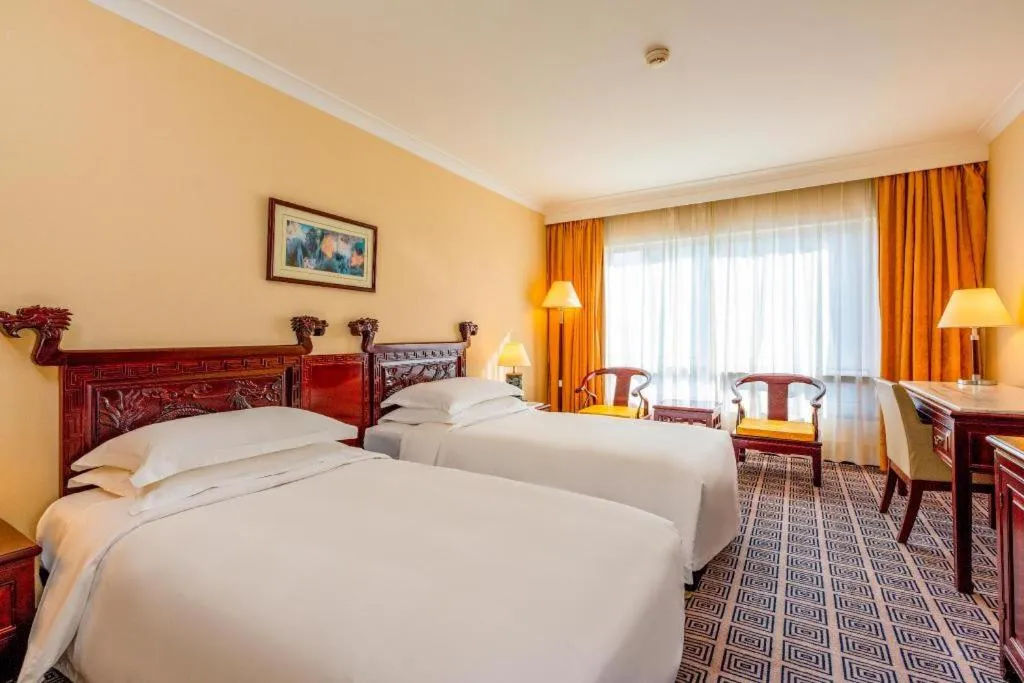 Bed in Grand Skylight Hotel Royal, Beijing