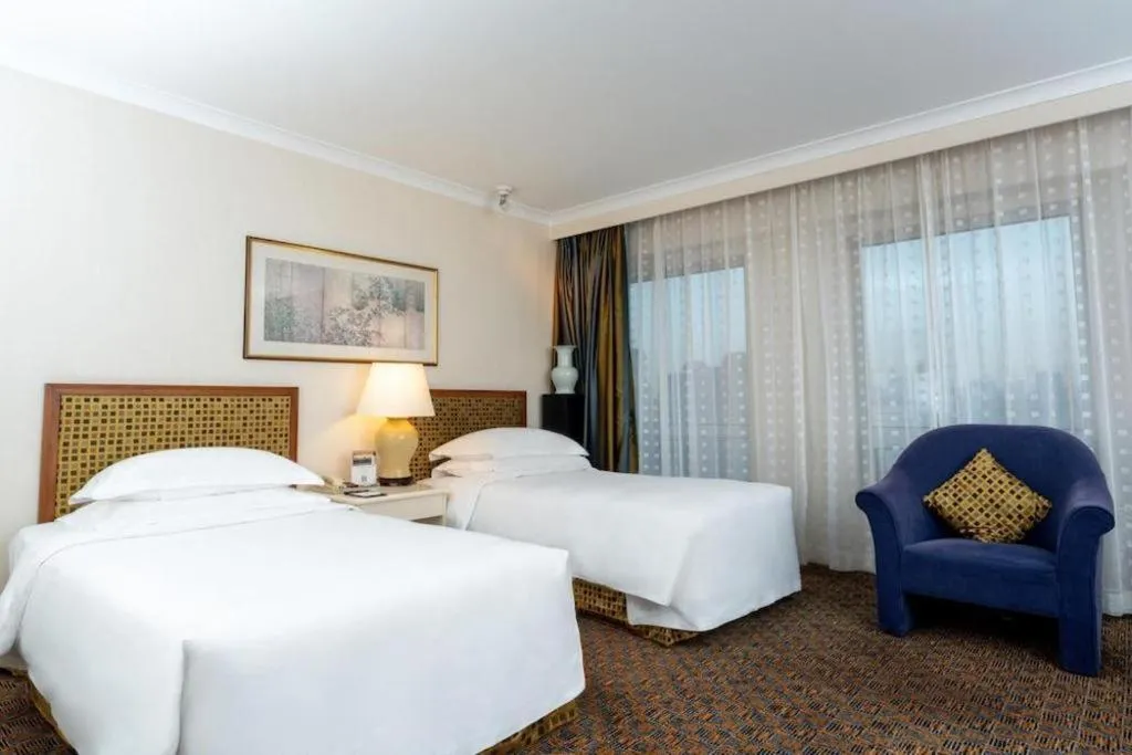 Bed in Grand Skylight Hotel Royal, Beijing