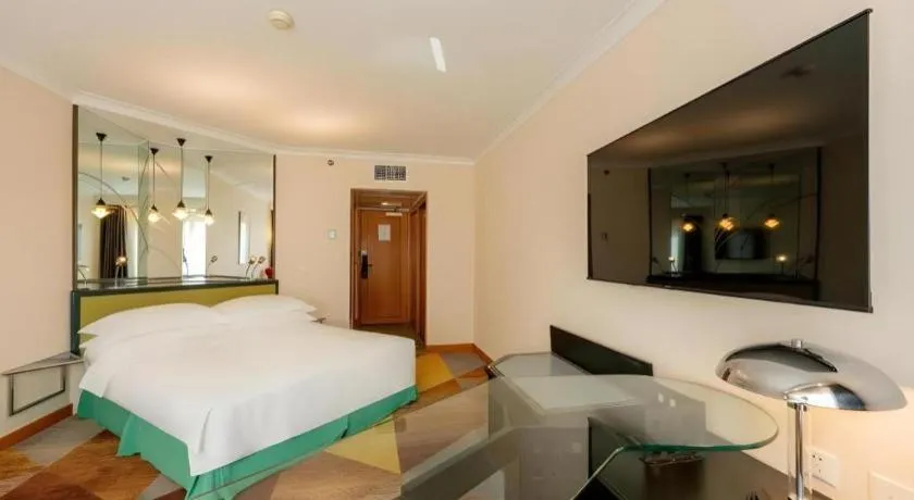 Bed in Grand Skylight Hotel Royal, Beijing