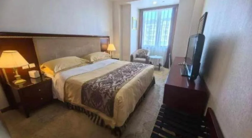 Bed in Xinhai Jinjiang Hotel
