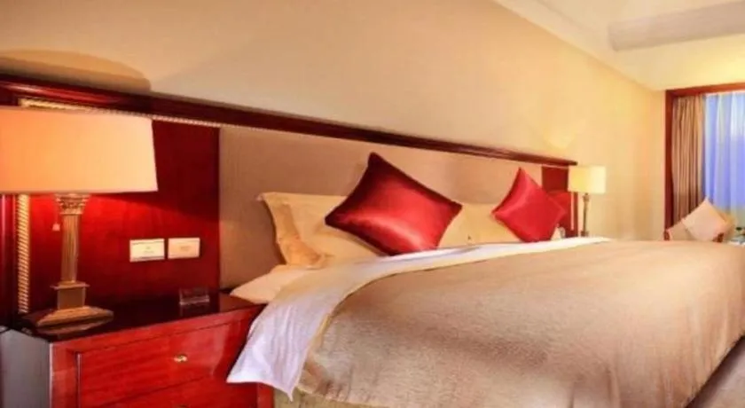 Bed in Xinhai Jinjiang Hotel