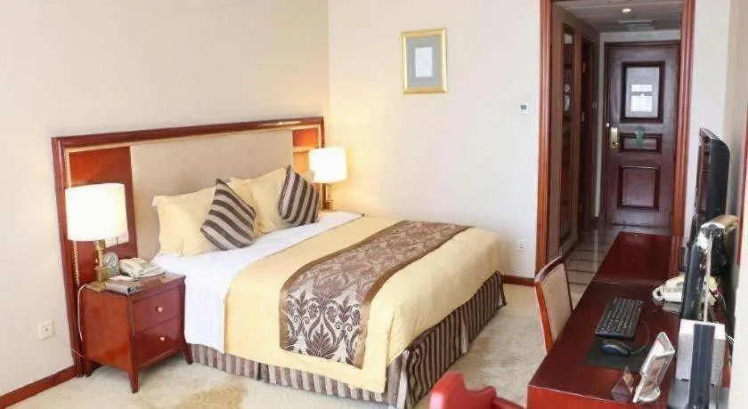 Bed in Xinhai Jinjiang Hotel