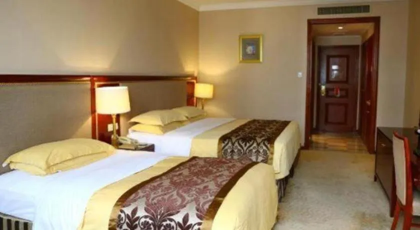 Bed in Xinhai Jinjiang Hotel