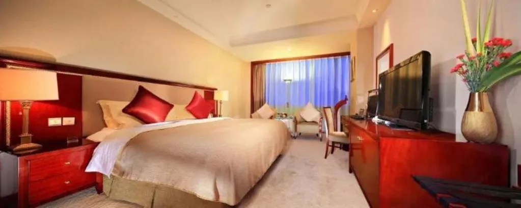 Bed in Xinhai Jinjiang Hotel