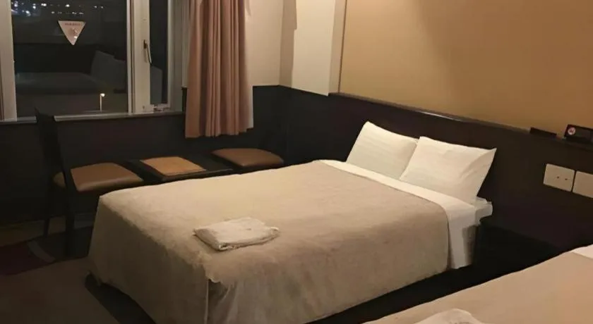 Bed in Hotel Gran View Okinawa