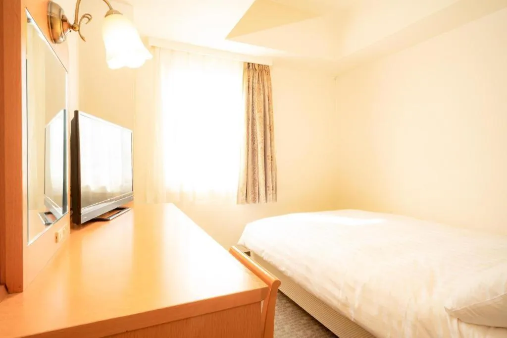 Bed in Smile Hotel Nishiakashi