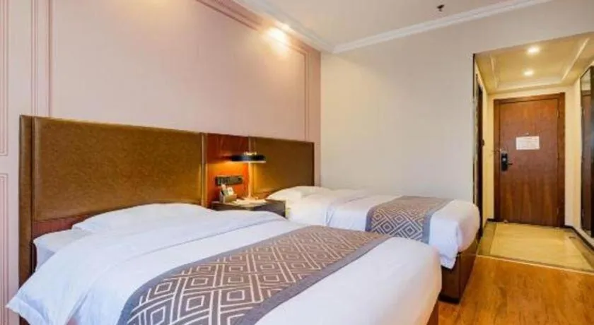 Bed in GME NanJing CaoChanGMEn Nanyihou Stress Hotel