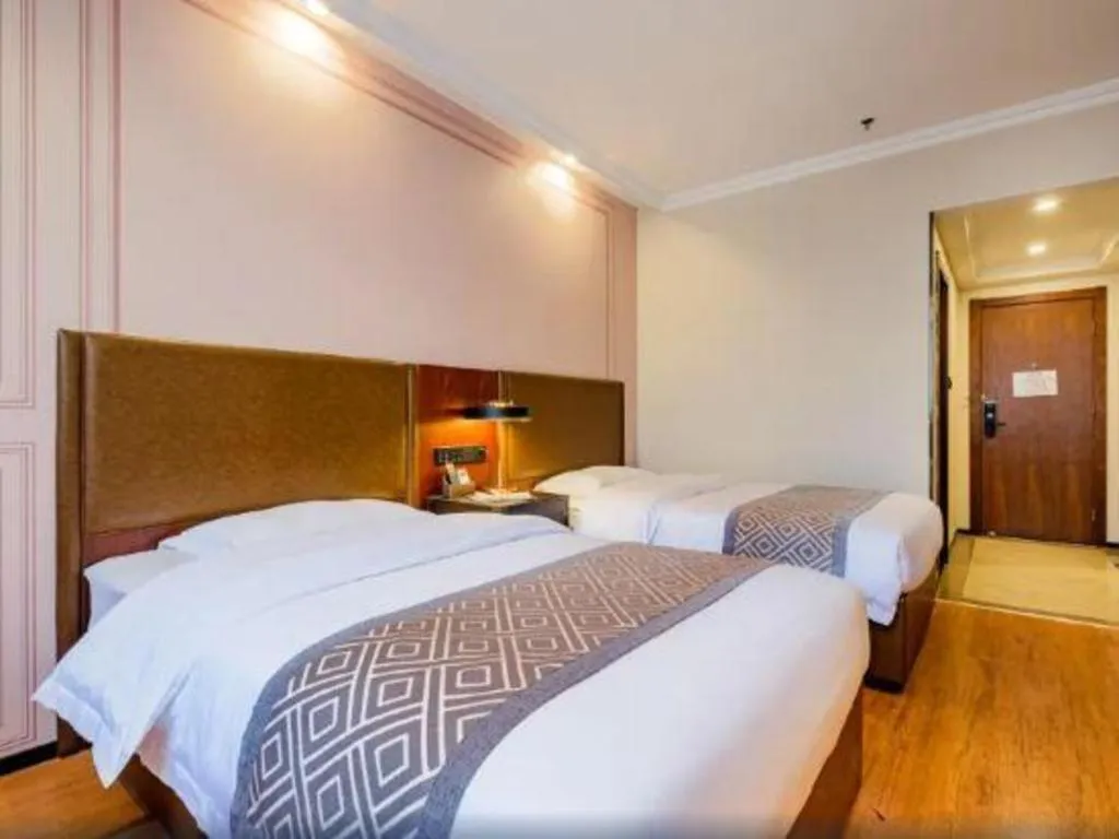 Bed in GME NanJing CaoChanGMEn Nanyihou Stress Hotel