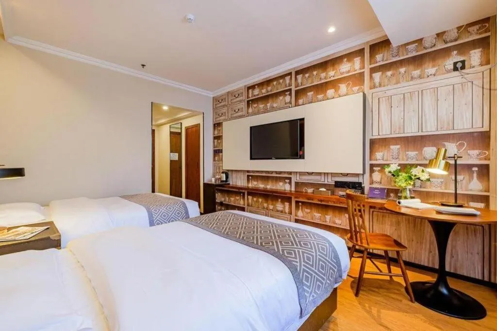 Bed in GME NanJing CaoChanGMEn Nanyihou Stress Hotel