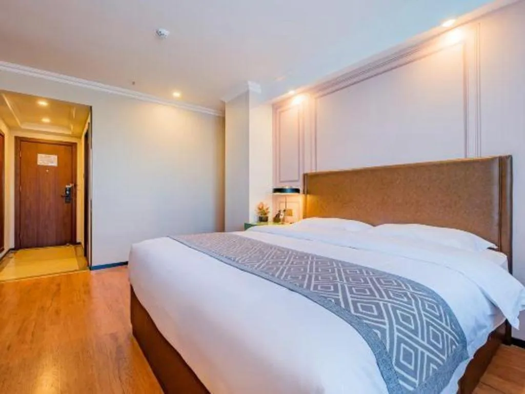 Bed in GME NanJing CaoChanGMEn Nanyihou Stress Hotel