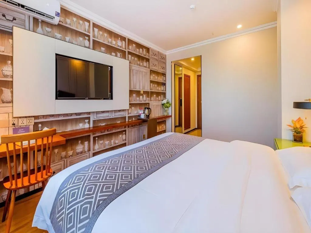 Bed in GME NanJing CaoChanGMEn Nanyihou Stress Hotel