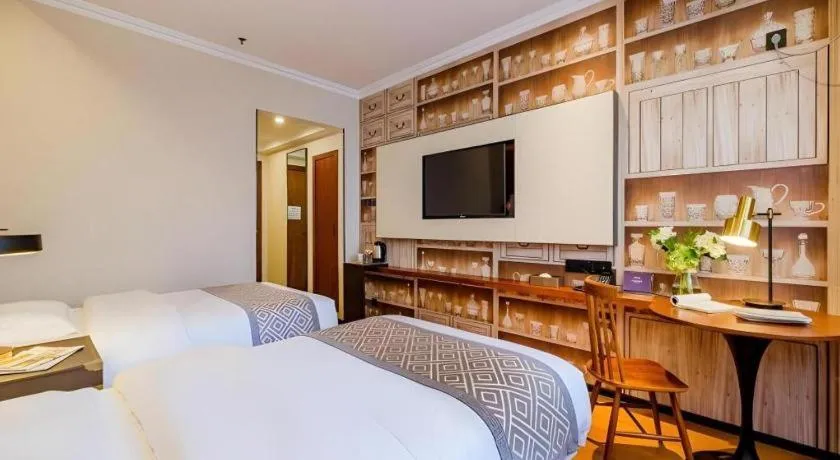 Bed in GME NanJing CaoChanGMEn Nanyihou Stress Hotel