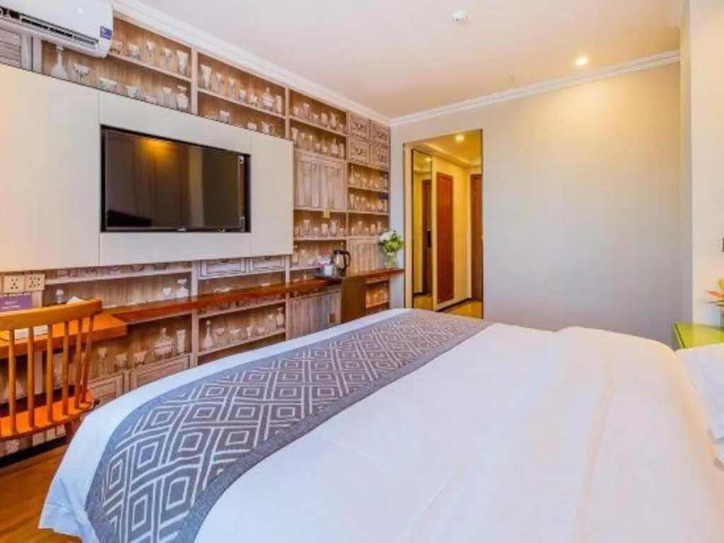 Bed in GME NanJing CaoChanGMEn Nanyihou Stress Hotel