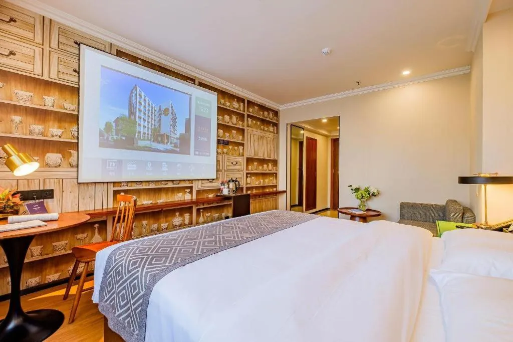 Bed in GME NanJing CaoChanGMEn Nanyihou Stress Hotel