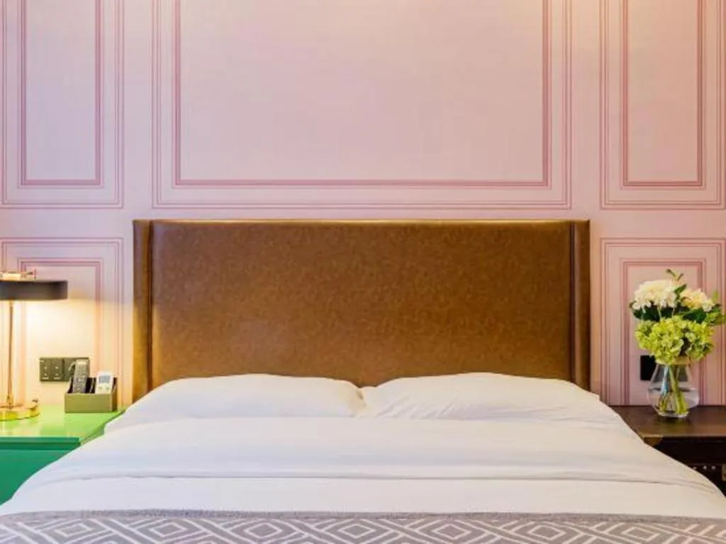 Bed in GME NanJing CaoChanGMEn Nanyihou Stress Hotel