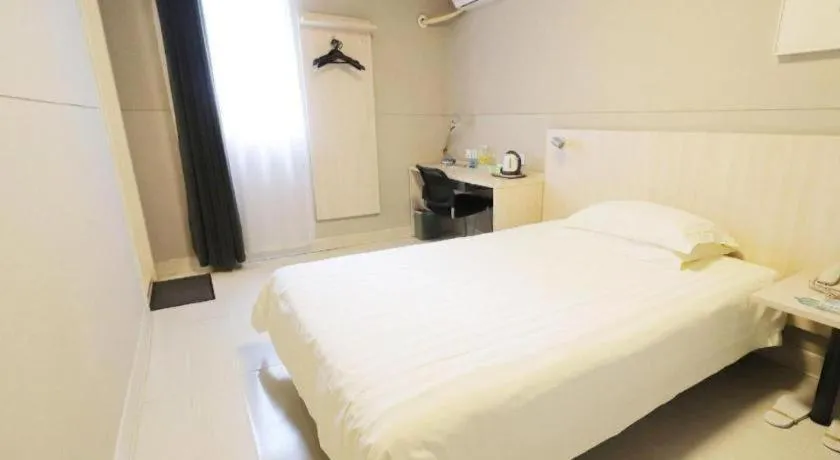 Bed in Jinjiang Inn Shanghai Minhang Zhuanqiao