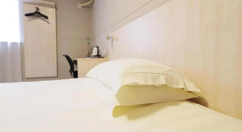 Bed in Jinjiang Inn Shanghai Minhang Zhuanqiao
