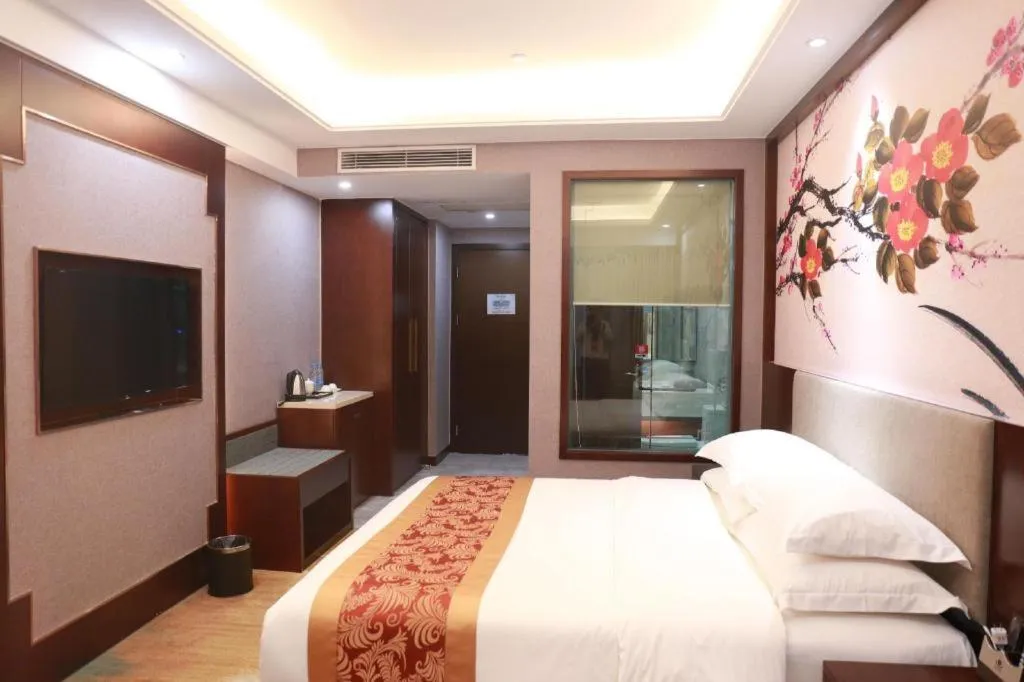 Bed in Nan Guo Hotel