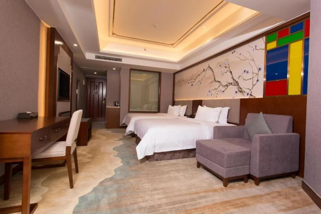 Bed in Nan Guo Hotel