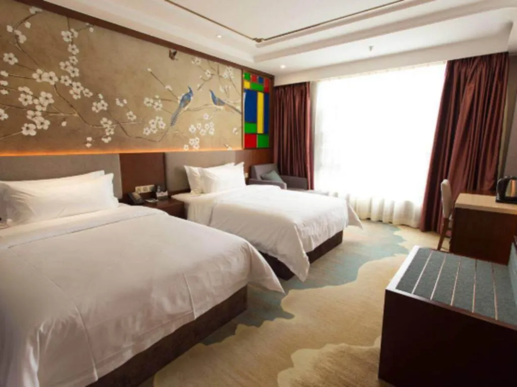 Bed in Nan Guo Hotel