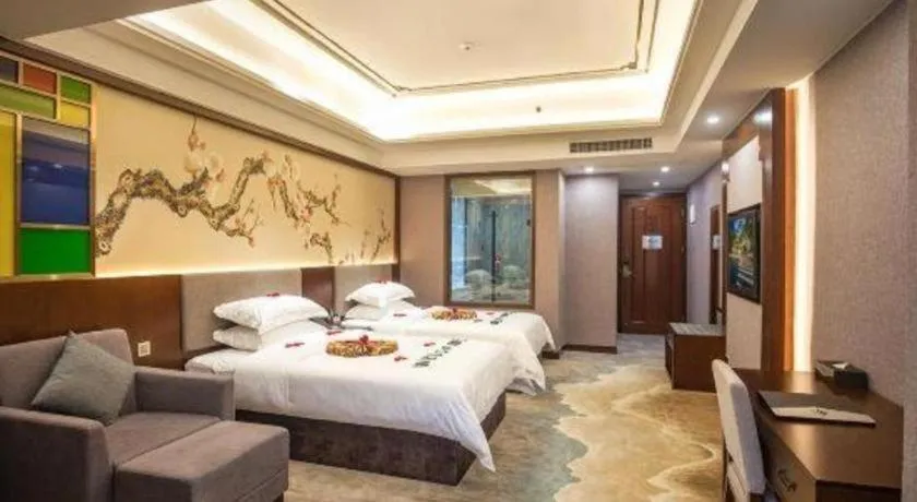 Bed in Nan Guo Hotel