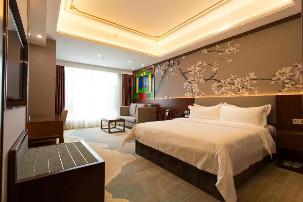 Bed in Nan Guo Hotel