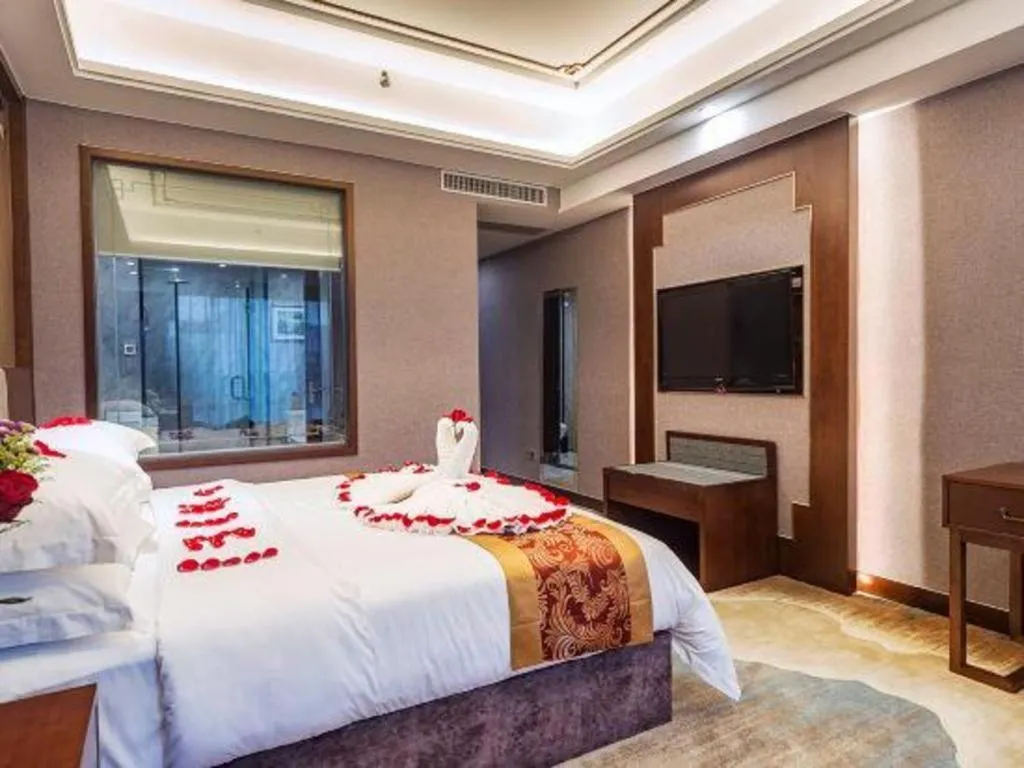 Bed in Nan Guo Hotel