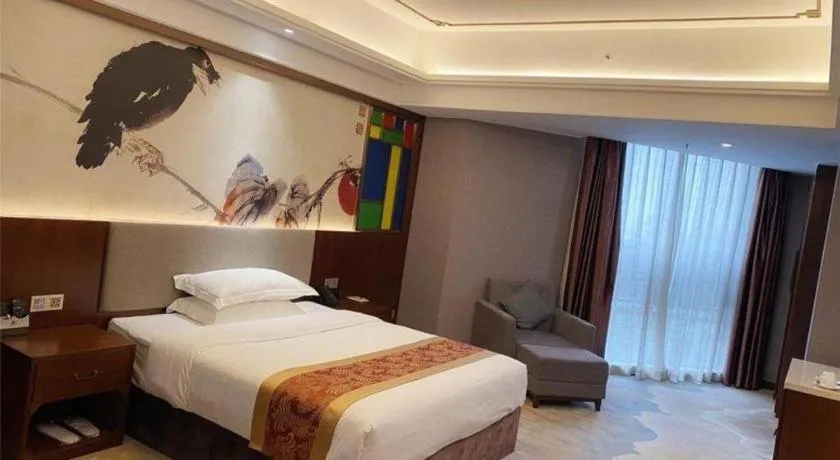 Bed in Nan Guo Hotel