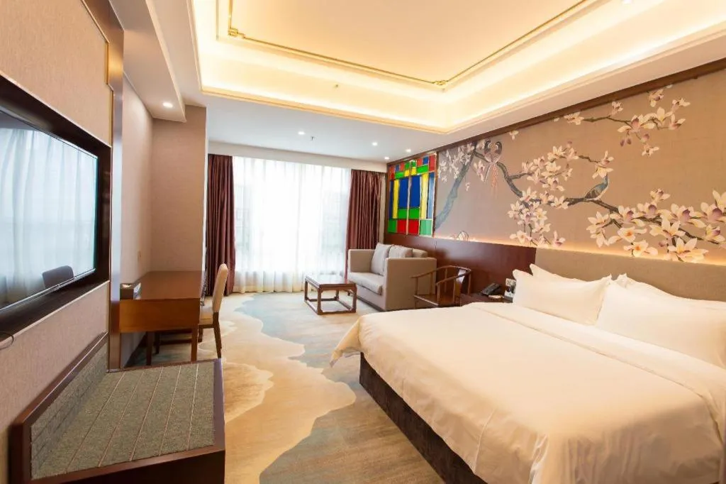 Bed in Nan Guo Hotel