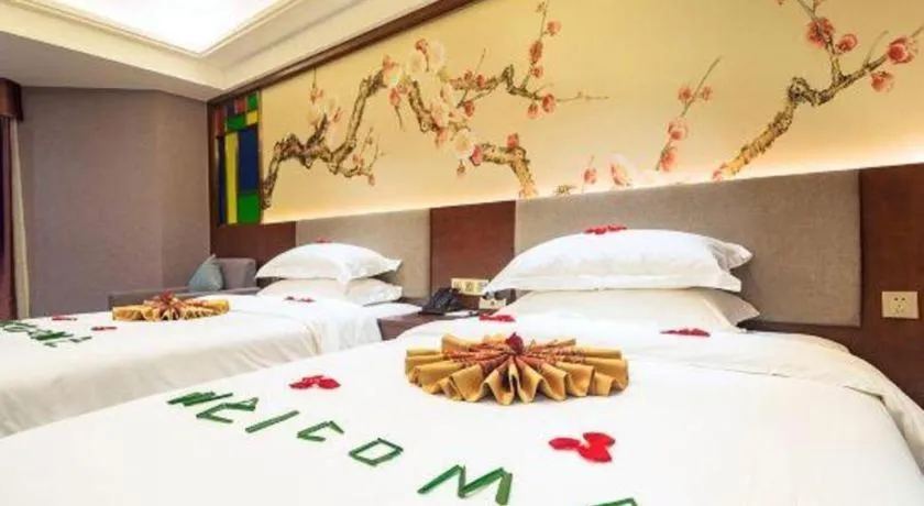 Bed in Nan Guo Hotel