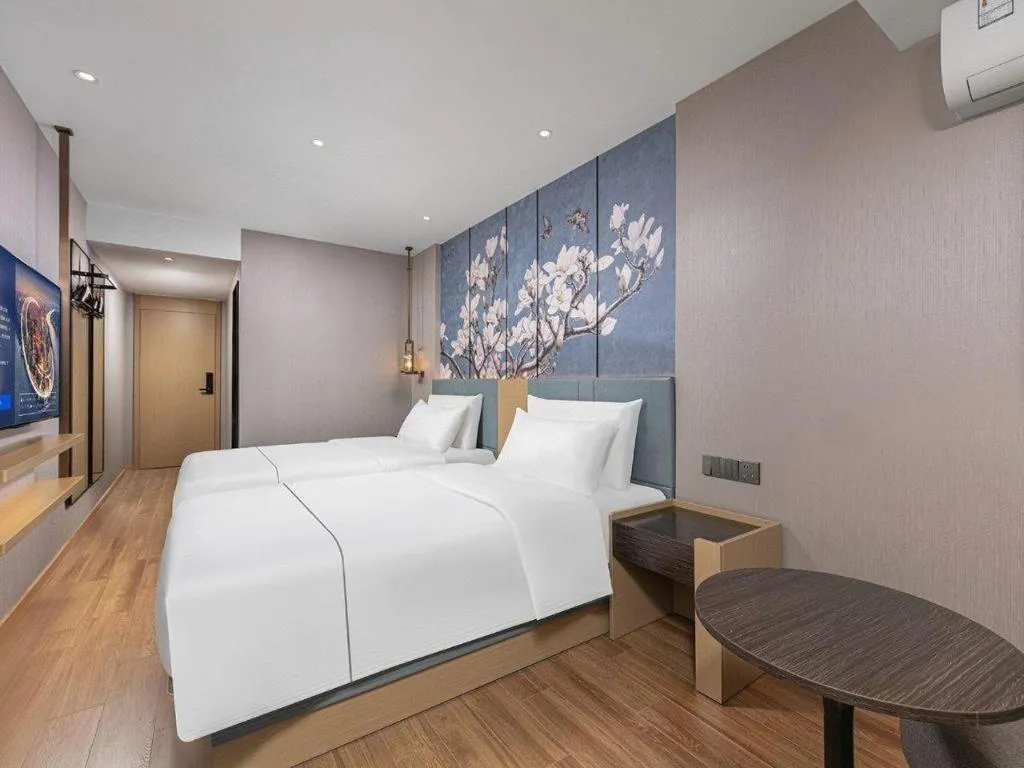 Bed in Magnotel Classic Shenyang General Hospital of Northern Theater Command