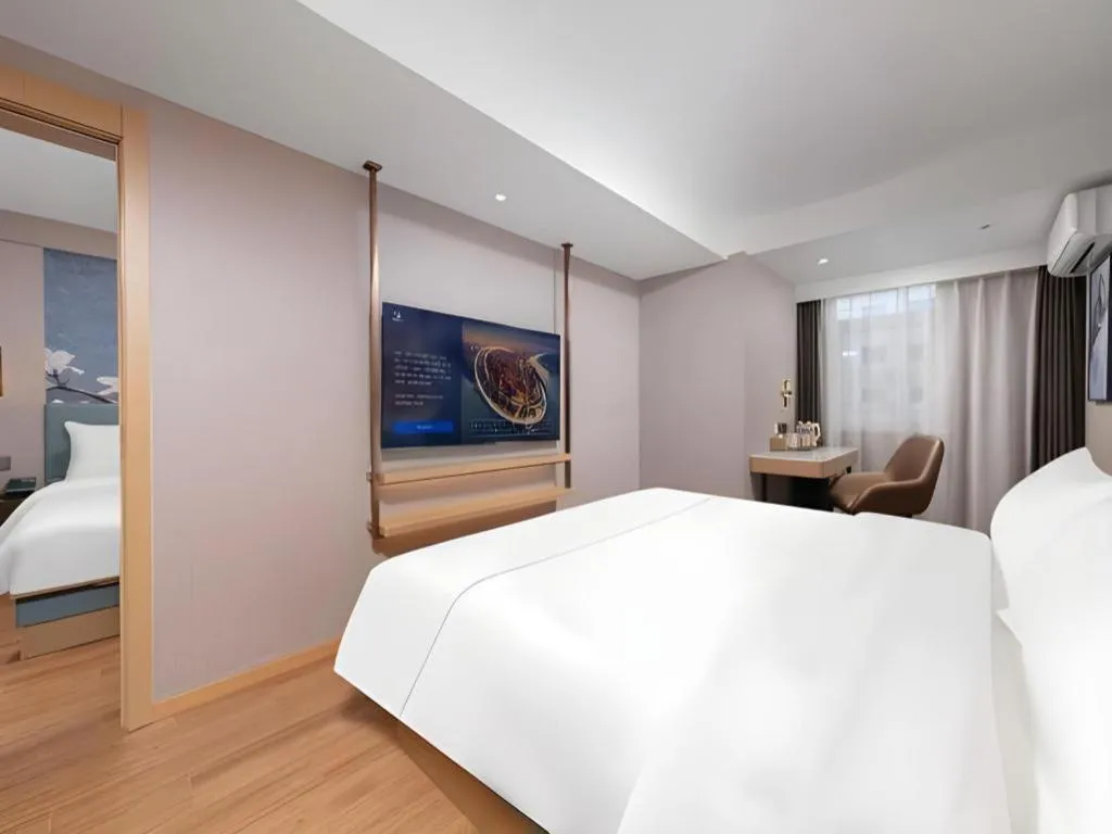 Bed in Magnotel Classic Shenyang General Hospital of Northern Theater Command