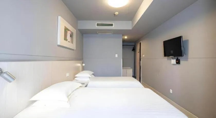 Bed in Magnotel Classic Shenyang General Hospital of Northern Theater Command