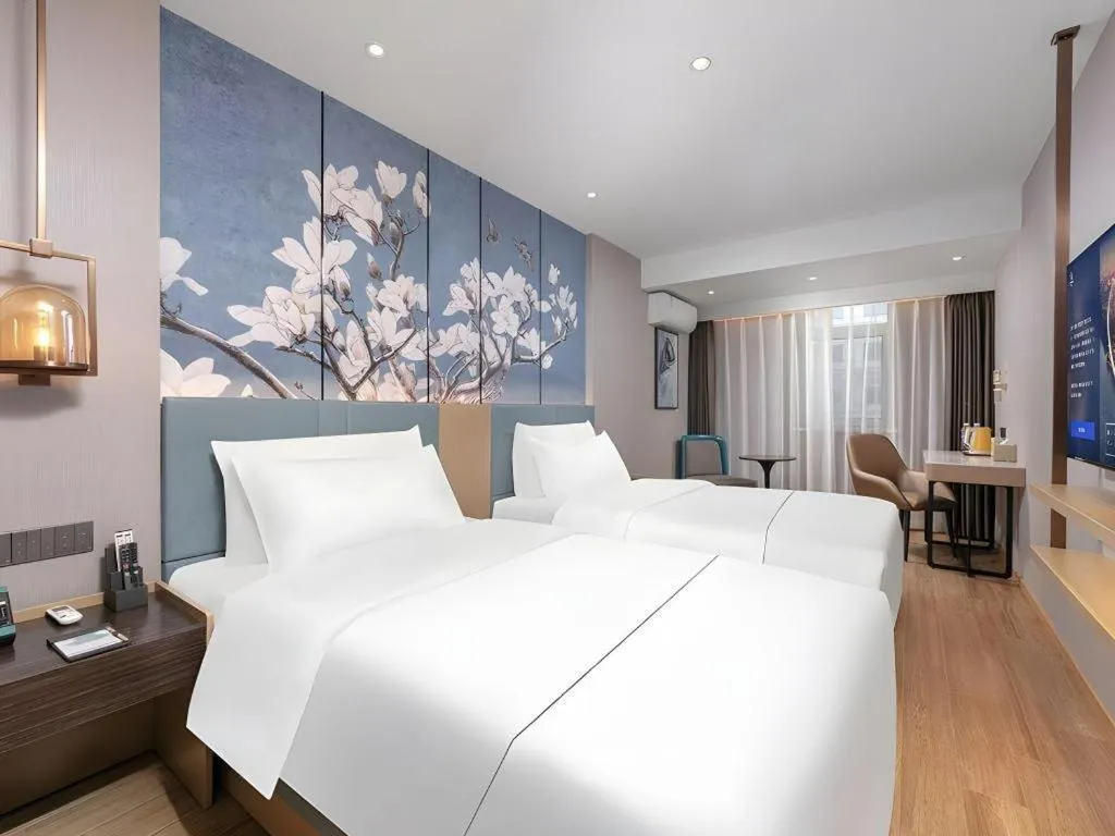 Bed in Magnotel Classic Shenyang General Hospital of Northern Theater Command