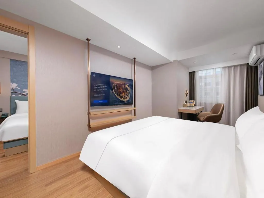 Bed in Magnotel Classic Shenyang General Hospital of Northern Theater Command