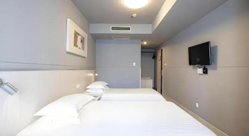 Bed in Magnotel Classic Shenyang General Hospital of Northern Theater Command