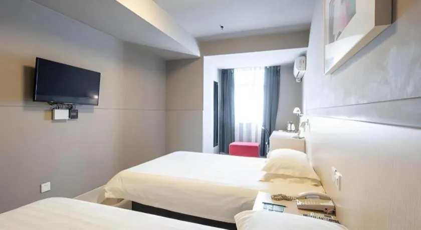 Bed in Magnotel Classic Shenyang General Hospital of Northern Theater Command