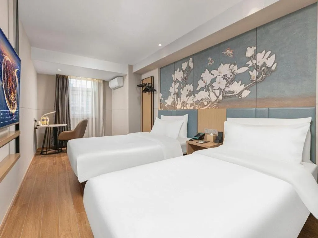 Bed in Magnotel Classic Shenyang General Hospital of Northern Theater Command