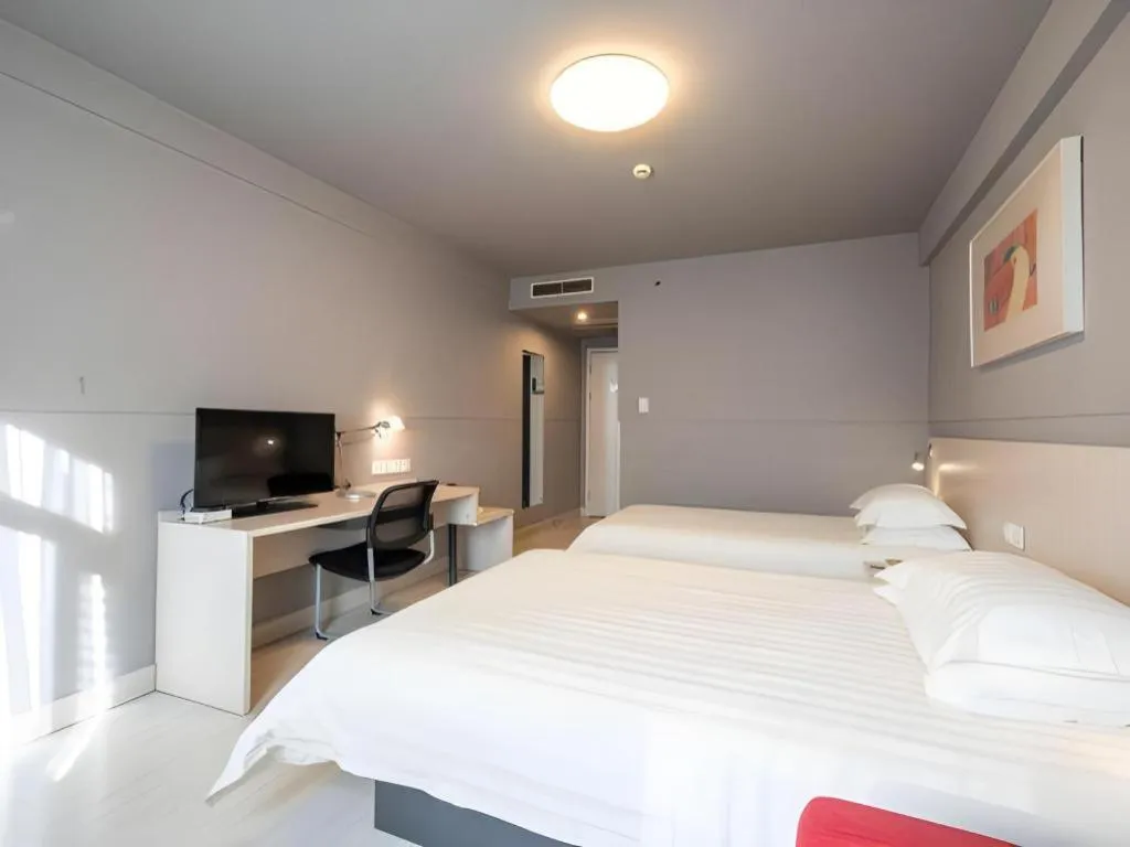 Bed in Magnotel Classic Shenyang General Hospital of Northern Theater Command