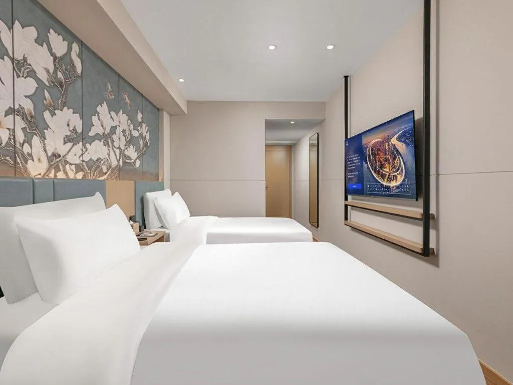 Bed in Magnotel Classic Shenyang General Hospital of Northern Theater Command