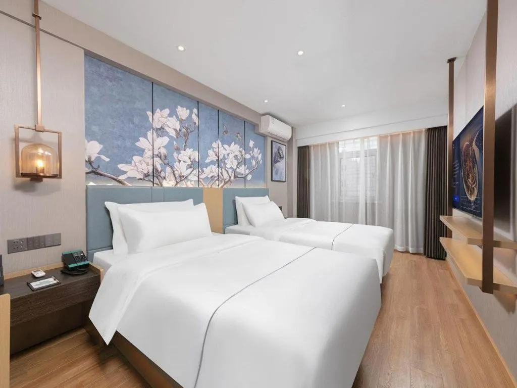 Bed in Magnotel Classic Shenyang General Hospital of Northern Theater Command