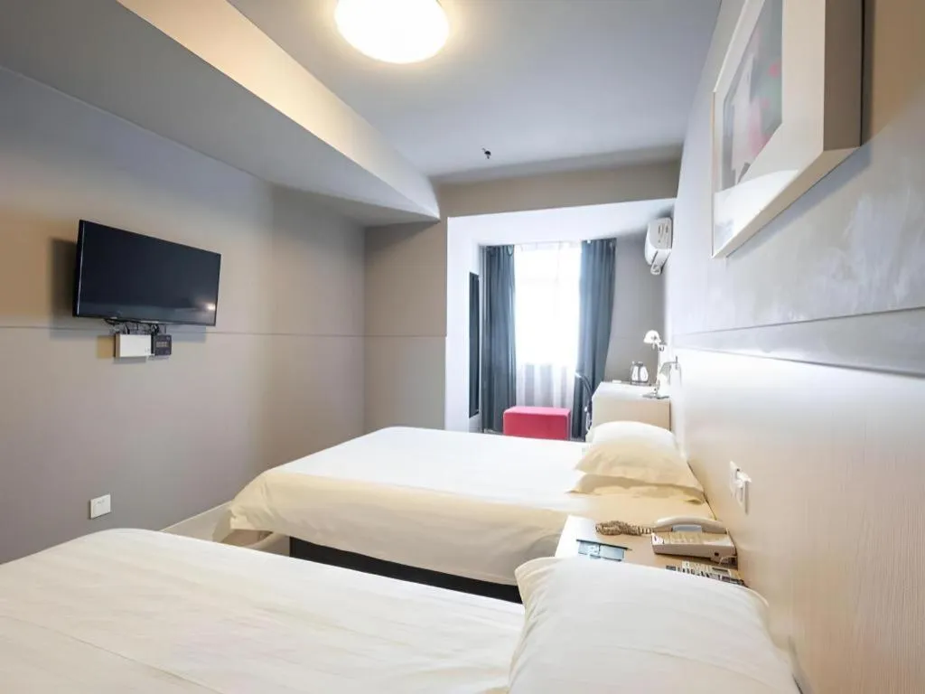 Bed in Magnotel Classic Shenyang General Hospital of Northern Theater Command