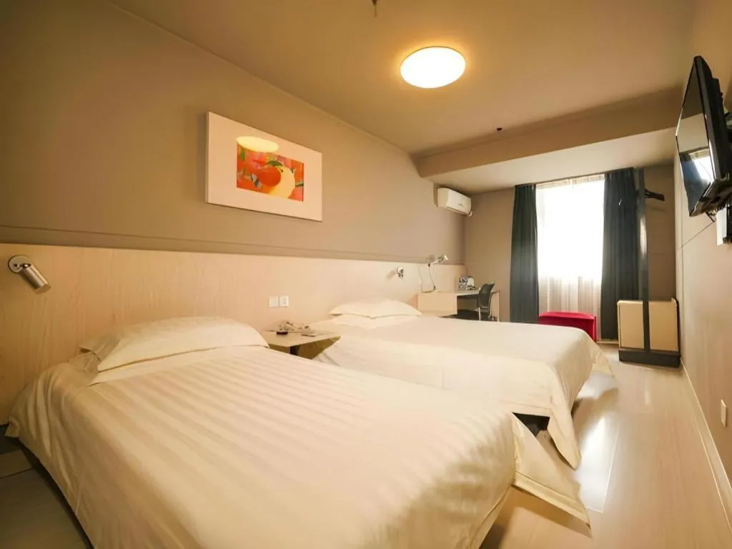 Bed in Magnotel Classic Shenyang General Hospital of Northern Theater Command