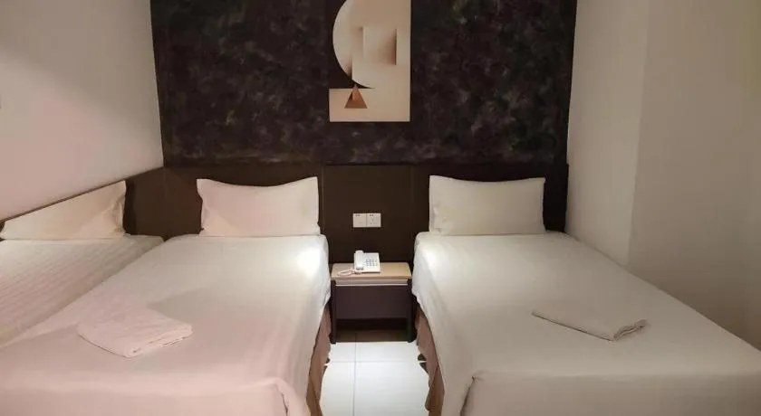 Bed in Jin Hotel