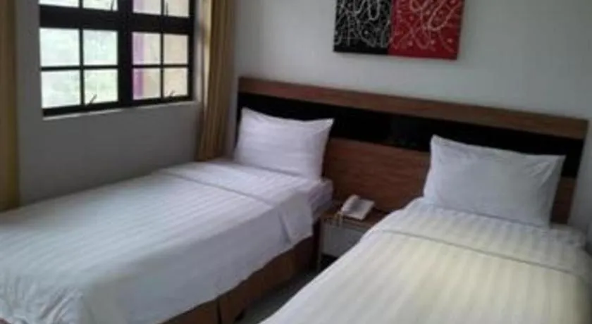Bed in Jin Hotel